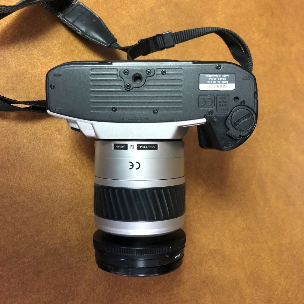 Minolta Maxxum STsi 35mm Film Camera with Minolta 28-80mm AF Zoom Lens